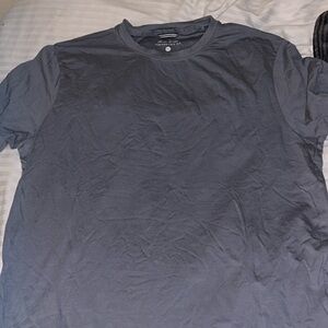 Plain grey men’s shirt size axle not even worn no tags